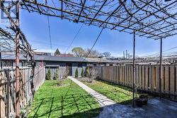 Backyard with double car garage - 