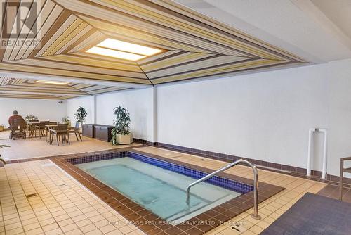 1401 - 2180 Marine Drive, Oakville, ON - Indoor Photo Showing Other Room With In Ground Pool