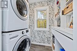 Convenient main floor laundry just off of kitchen - 