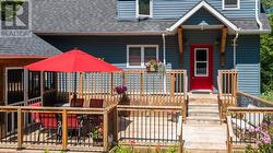 Wrap around deck leading to dining room walkout - 