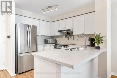 Ph7 - 2565 Erin Centre Boulevard, Mississauga, ON - Indoor Photo Showing Kitchen With Stainless Steel Kitchen With Double Sink