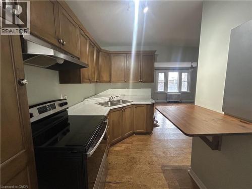 352 Hunter Street E Unit# 4, Hamilton, ON - Indoor Photo Showing Kitchen With Double Sink