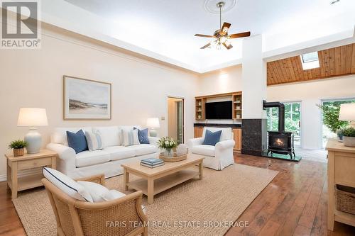 Virtually Staged - 105 Copeland Creek Drive, Tiny, ON - Indoor Photo Showing Living Room