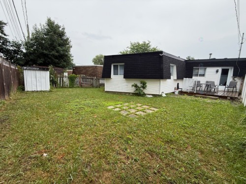 Cour - 299 Rue De La Reine, Laval (Auteuil), QC - Outdoor With Deck Patio Veranda