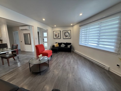 Salon - 299 Rue De La Reine, Laval (Auteuil), QC - Indoor Photo Showing Living Room