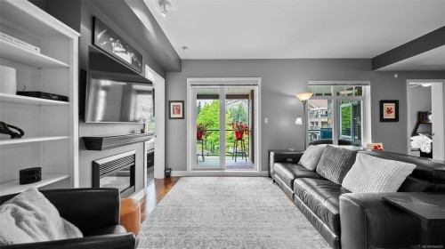 #203-1375 Bear Mountain Pkwy, Langford, BC - Indoor Photo Showing Living Room With Fireplace