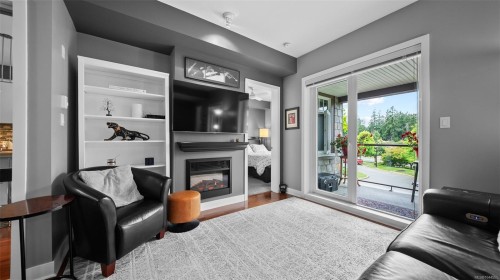 #203-1375 Bear Mountain Pkwy, Langford, BC - Indoor Photo Showing Living Room With Fireplace