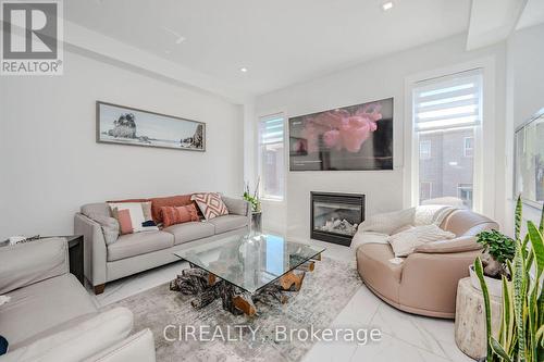 4712 Doug Wright Drive, Burlington, ON - Indoor Photo Showing Living Room With Fireplace