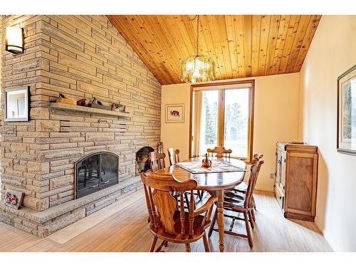 4600 Mapleward Rd., Thunder Bay, ON - Indoor Photo Showing Dining Room With Fireplace