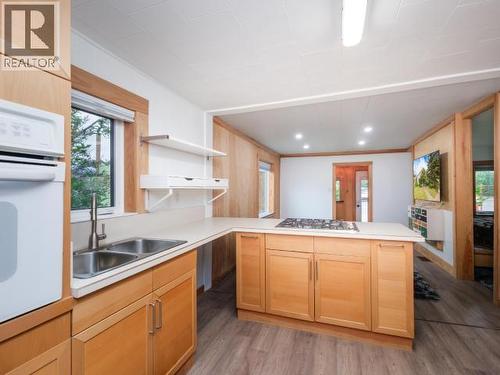 606 Ogilvie Street, Whitehorse, YT - Indoor Photo Showing Kitchen With Double Sink