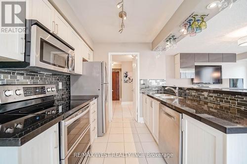 309 - 190 Manitoba Street, Toronto, ON - Indoor Photo Showing Kitchen With Upgraded Kitchen