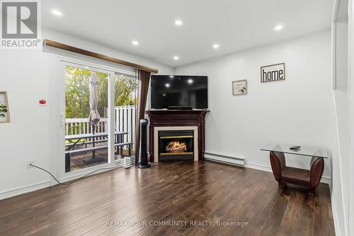 11 Grantbrook Court, Brampton, ON - Indoor Photo Showing Other Room With Fireplace