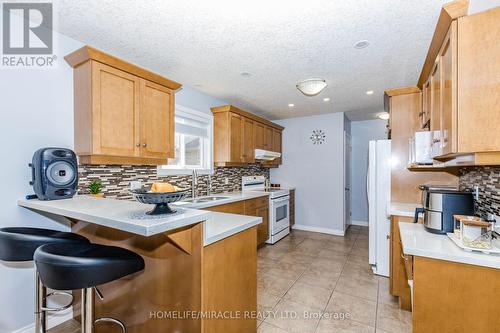 39 Washburn Drive, Guelph, ON - Indoor Photo Showing Kitchen With Double Sink