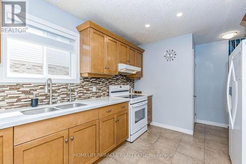 39 Washburn Drive, Guelph, ON - Indoor Photo Showing Kitchen With Double Sink