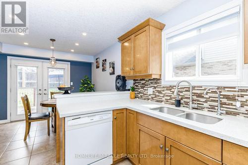 39 Washburn Drive, Guelph, ON - Indoor Photo Showing Kitchen With Double Sink