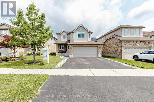 39 Washburn Drive, Guelph, ON - Outdoor With Facade