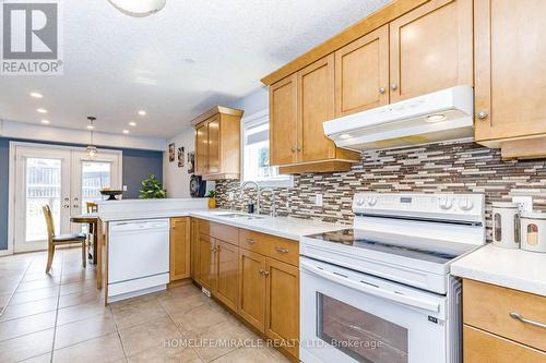 39 Washburn Drive, Guelph, ON - Indoor Photo Showing Kitchen With Double Sink