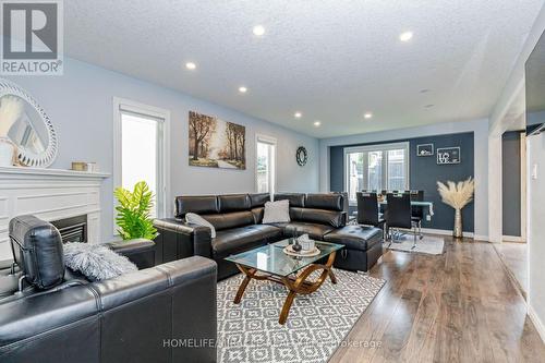 39 Washburn Drive, Guelph, ON - Indoor Photo Showing Living Room With Fireplace