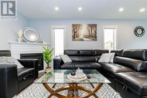 39 Washburn Drive, Guelph, ON - Indoor Photo Showing Living Room With Fireplace