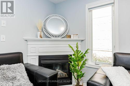 39 Washburn Drive, Guelph, ON - Indoor With Fireplace