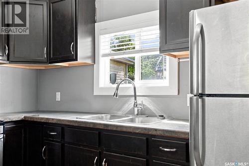 215 26Th Street W, Saskatoon, SK - Indoor Photo Showing Kitchen With Double Sink