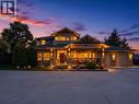 4588 Raymer Road, Kelowna, BC  - Outdoor With Deck Patio Veranda With Facade 