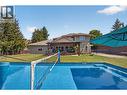4588 Raymer Road, Kelowna, BC  - Outdoor With In Ground Pool With Backyard 