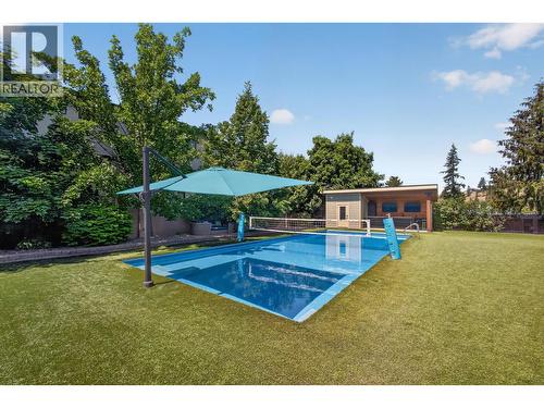 4588 Raymer Road, Kelowna, BC - Outdoor With In Ground Pool With Backyard