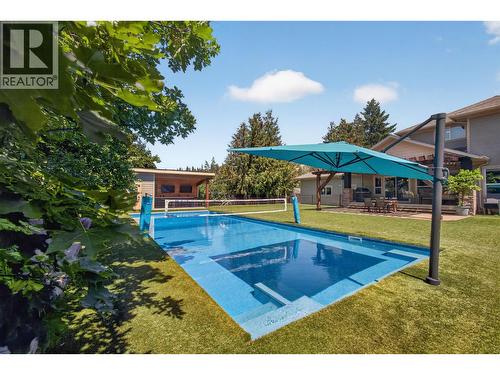 4588 Raymer Road, Kelowna, BC - Outdoor With In Ground Pool With Backyard