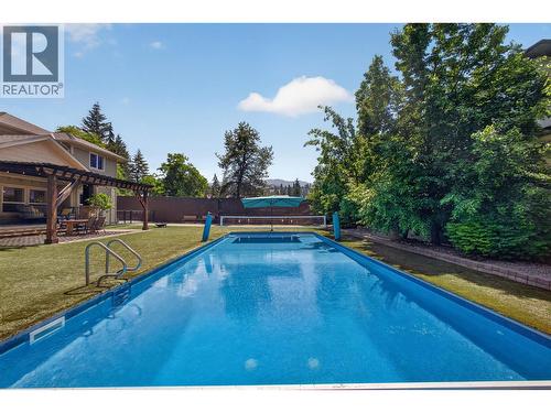 4588 Raymer Road, Kelowna, BC - Outdoor With In Ground Pool With Backyard