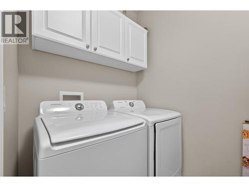 suite laundry - 4588 Raymer Road, Kelowna, BC - Indoor Photo Showing Laundry Room