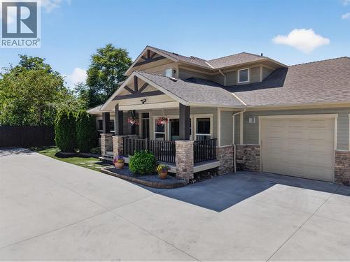4588 Raymer Road, Kelowna, BC - Outdoor With Facade