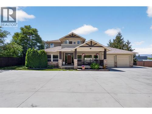 4588 Raymer Road, Kelowna, BC - Outdoor With Facade