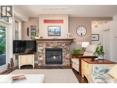 333 Longspoon Drive Unit# 19, Vernon, BC - Indoor Photo Showing Living Room With Fireplace