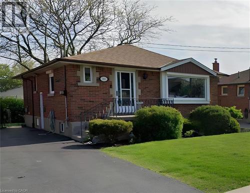 Brick exterior with a gabled roof and a large bay window - 781 Ninth Avenue Unit# Lower, Hamilton, ON - Outdoor