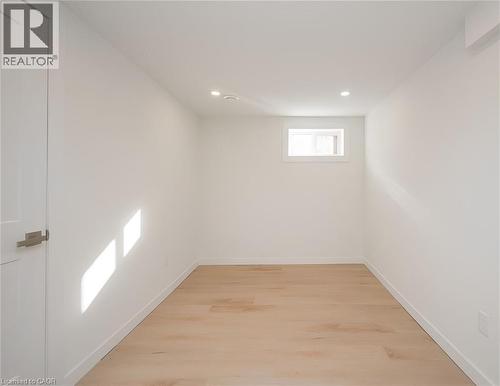 Bright interior room featuring a window, light wood-finish flooring, and recessed ceiling lighting - 781 Ninth Avenue Unit# Lower, Hamilton, ON - Indoor Photo Showing Other Room
