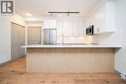 210 6968 ROYAL OAK AVENUE Burnaby, BC V5J 4J2