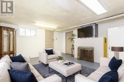Virtually staged - 29 Tecumseth Street, Orillia, ON - Indoor Photo Showing Living Room With Fireplace