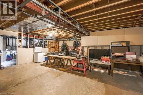 Unfinished basement featuring exposed wood joists and metal framing - 123 Benn Drive, Cambridge, ON - Indoor Photo Showing Basement