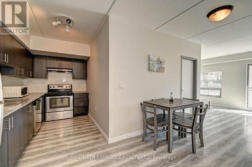209F - 275 Larch Street, Waterloo, ON - Indoor Photo Showing Kitchen With Stainless Steel Kitchen