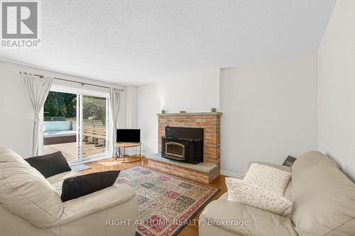 123 Benn Drive, Cambridge, ON - Indoor Photo Showing Living Room With Fireplace