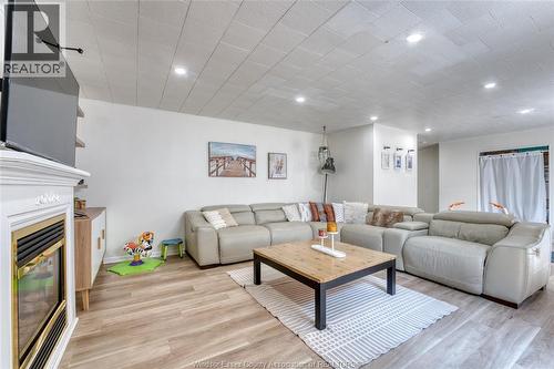 12437 St Thomas, Tecumseh, ON - Indoor Photo Showing Living Room With Fireplace