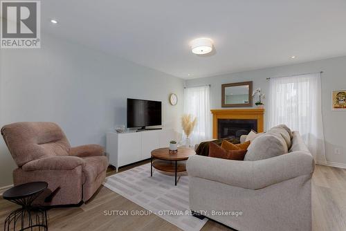 2719 Grand Canal Street, Ottawa, ON - Indoor Photo Showing Living Room With Fireplace
