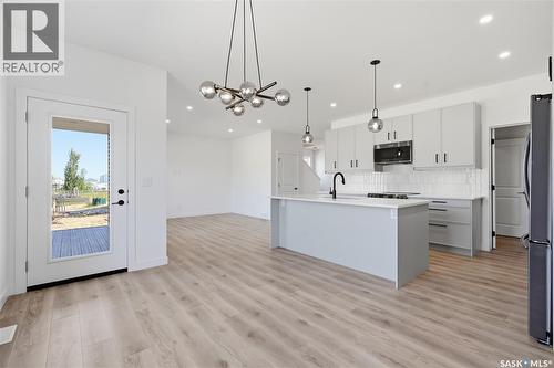 224 Froese Crescent, Warman, SK - Indoor Photo Showing Kitchen With Upgraded Kitchen