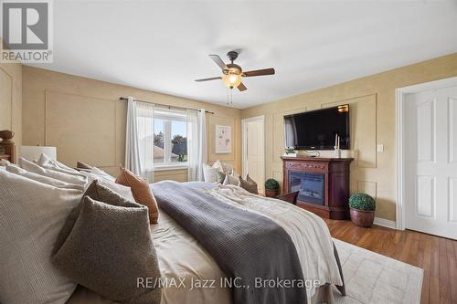 140 Taylorwood Court, Oshawa (Samac), ON - Indoor Photo Showing Bedroom With Fireplace
