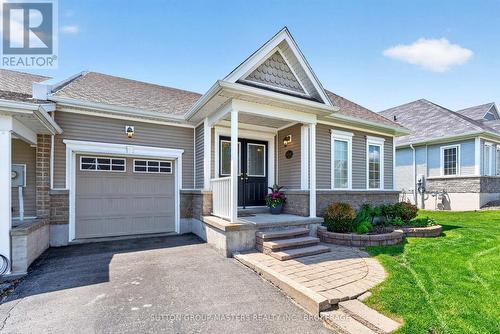 133 Britannia Crescent, Loyalist (Bath), ON - Outdoor With Facade