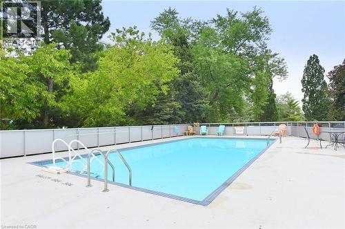 2263 Marine Drive Unit# 401, Oakville, ON - Outdoor With In Ground Pool With Backyard