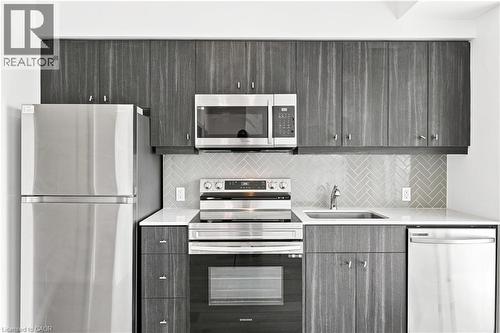 101 Golden Eagle Road Unit# 215, Waterloo, ON - Indoor Photo Showing Kitchen With Upgraded Kitchen