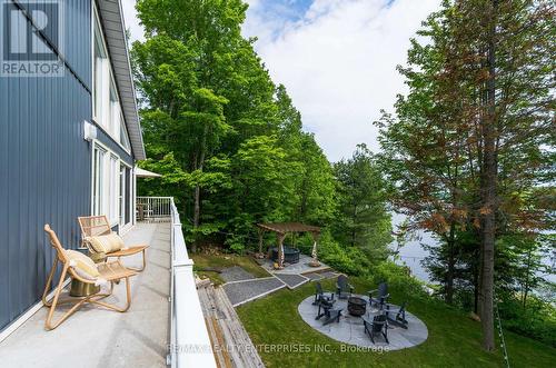Balcony with lake view off primary bedroom - 140 Rachels Lane, Huntsville, ON - Outdoor