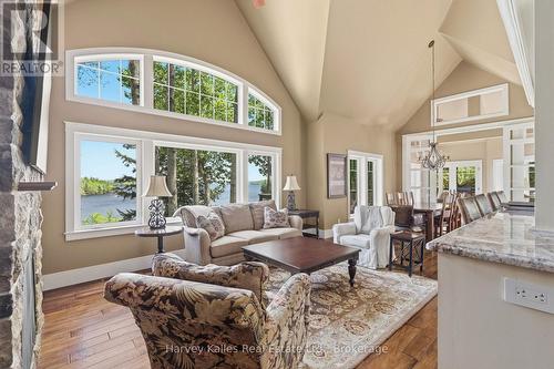 161 Town Line Road E, Huntsville (Chaffey), ON - Indoor Photo Showing Living Room With Fireplace